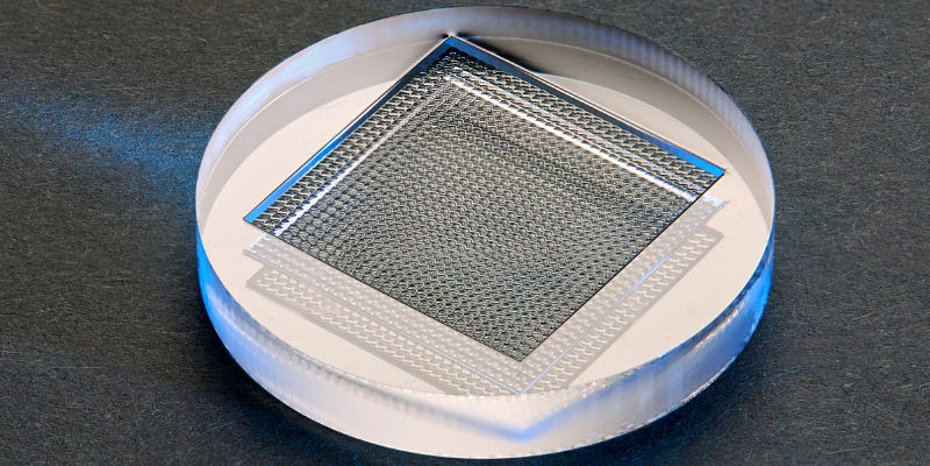 Laser Manufacturing of Glass Optics